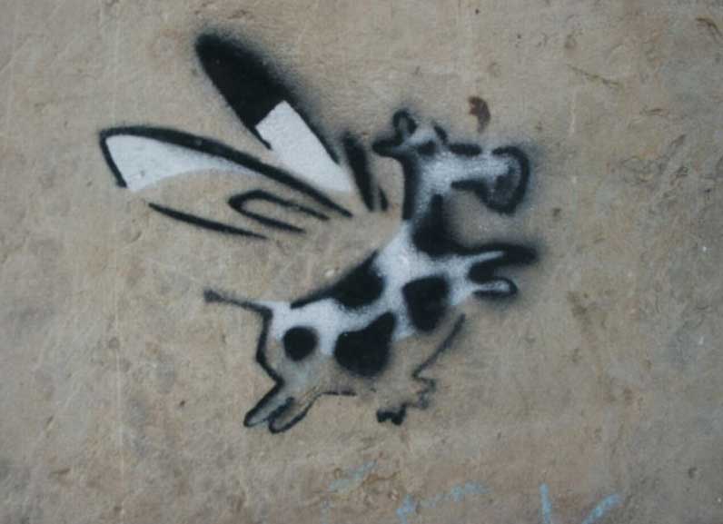Darstellung einer fliegenden Kuh als Graffiti